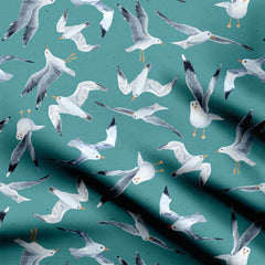 Soaring Above Teal Blue Print Fabric